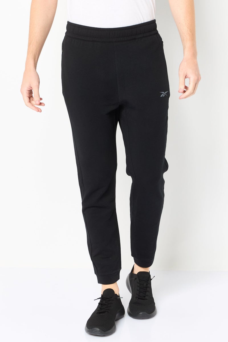 Reebok Men Sportswear Fit Outdoor Sweatpants, Black - Image 1