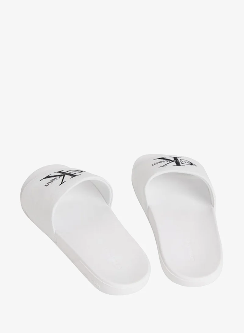 Calvin Klein Bright White/Black Cotton Canvas Monologo Sliders for Women | Best Price UAE