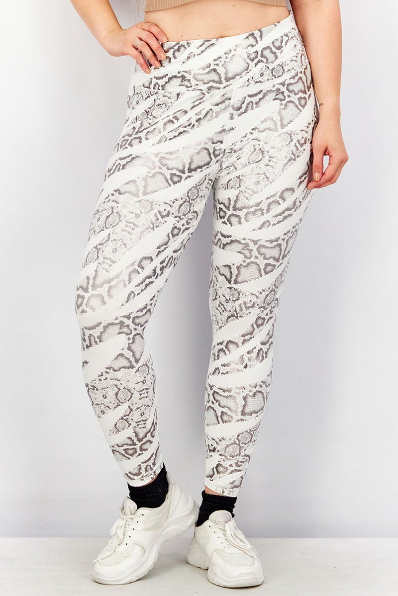 PUMA Women Textured Leggings, White and Silver  - Image 1