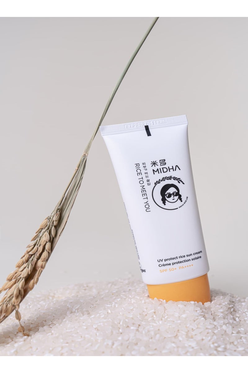 MIDHA UV Protect Rice Sun Cream 50ml offers broad-spectrum UVA/UVB protection with SPF 50+ and PA++++ in a lightweight, soft-cream formula infused with patented rice bran extract.  Finish without leaving a white cast, while remaining hypoallergenic and suitable for all skin types—including oily, dry, and combo. - Image 1