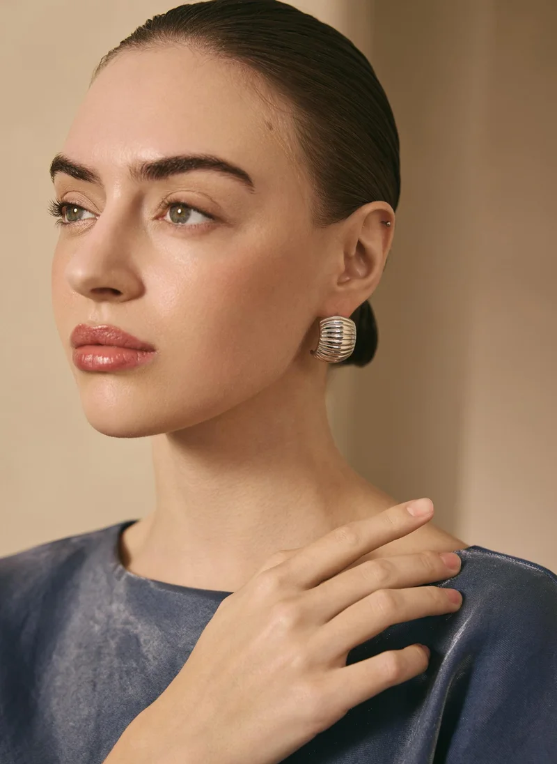 Lichi  Voluminous stud earrings with ribbed texture for Women | Best Price UAE