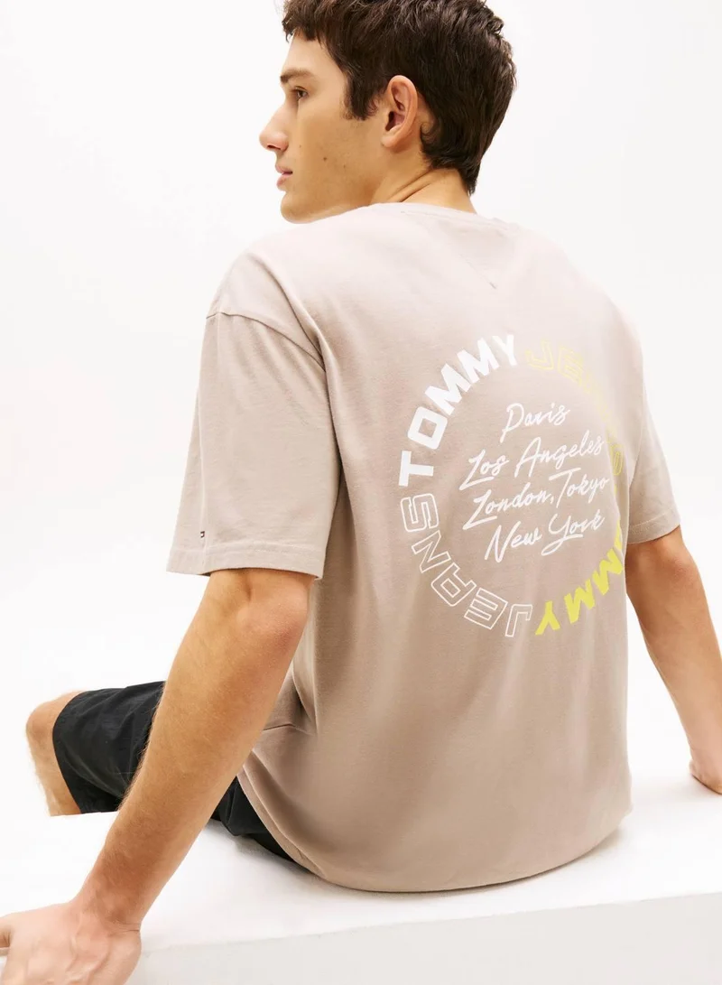 TOMMY JEANS Limestone Dust Circular Back Logo Relaxed T-Shirt for Men | Best Price UAE