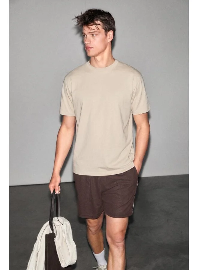 GRIMELANGE FAYIN Men's Soft and Stretchy Fabric Organic Cotton Round Neck Beige T-Shirt.