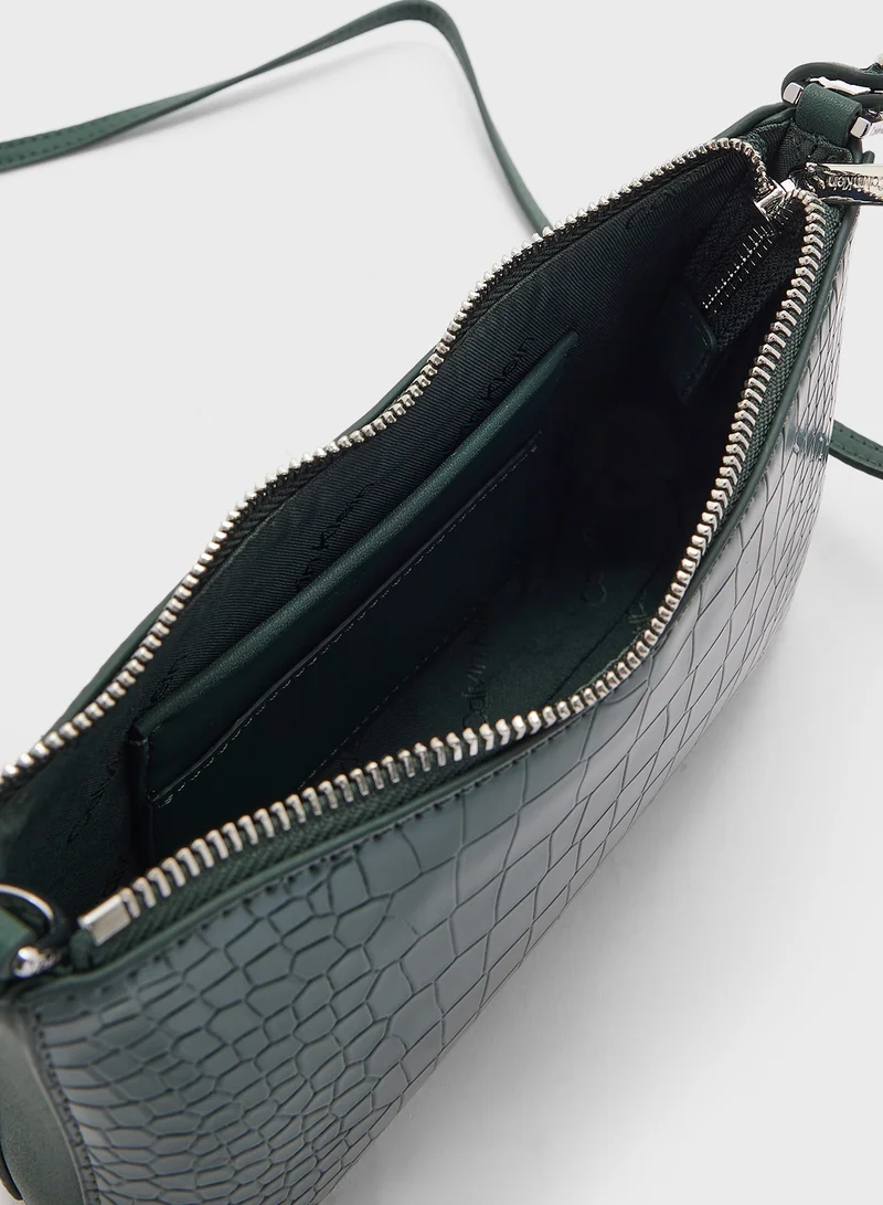 CALVIN KLEIN CK MUST CONV CROSSBODY_CROCO