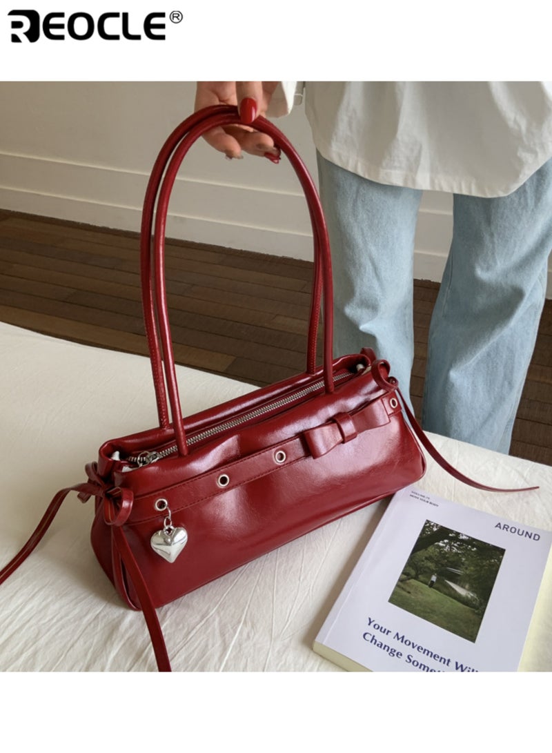 ريوكل حقيبة كتف نسائية بتصميم كلاسيكي مصنوعة من الجلد المصقول مع تفاصيل أنيقة من الأقواس وقلادات القلب مستوحاة من الطراز العتيق لتكون الإضافة المثالية للإطلالات اليومية والعادية - Image 1