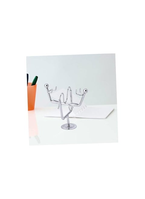 "Enjoy an experience of balance and calm with the Newton's Cradle - elegant design, smooth movement, and a clever decorative touch that adds a sophisticated scientific touch to your office or home. "