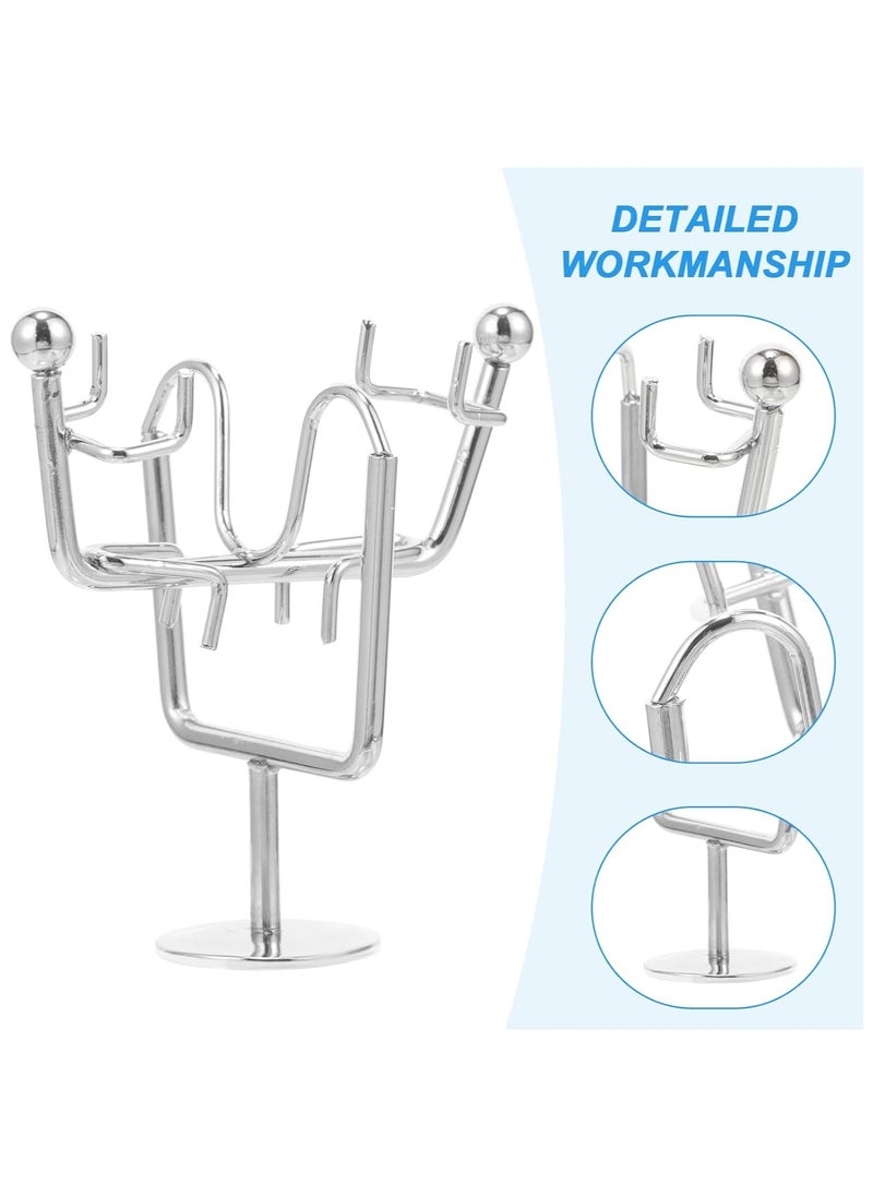 "Enjoy an experience of balance and calm with the Newton's Cradle - elegant design, smooth movement, and a clever decorative touch that adds a sophisticated scientific touch to your office or home. "