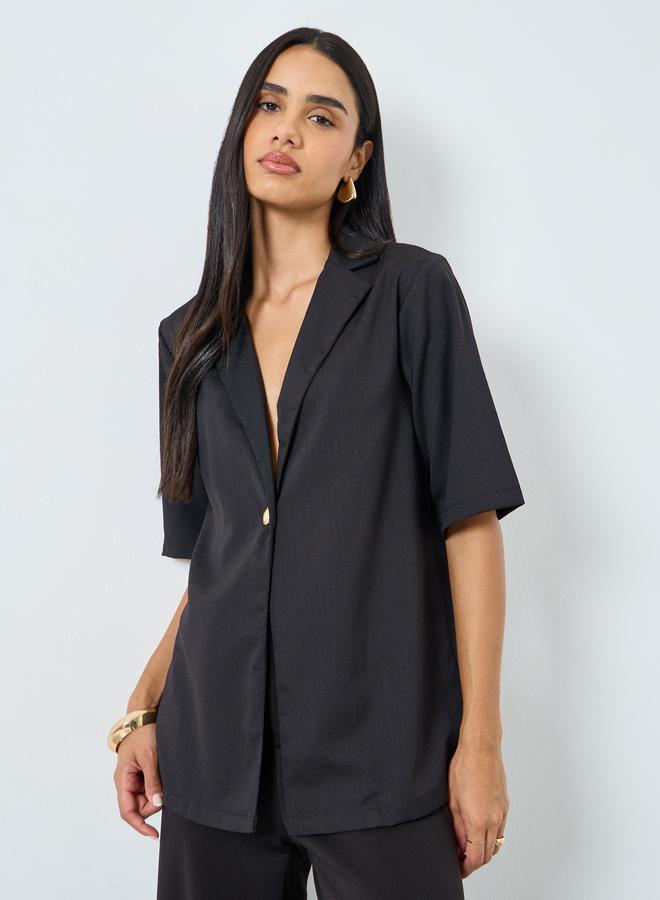 ستايلي بلوزة بقصة بوكسي وأكمام قصيرة - Image 3