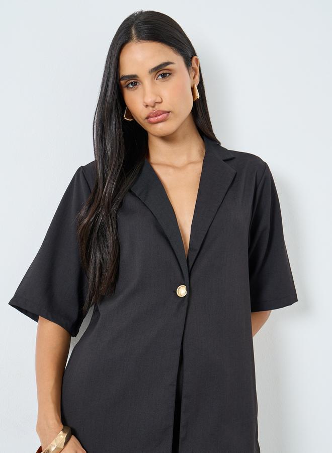 ستايلي بلوزة بقصة بوكسي وأكمام قصيرة - Image 1