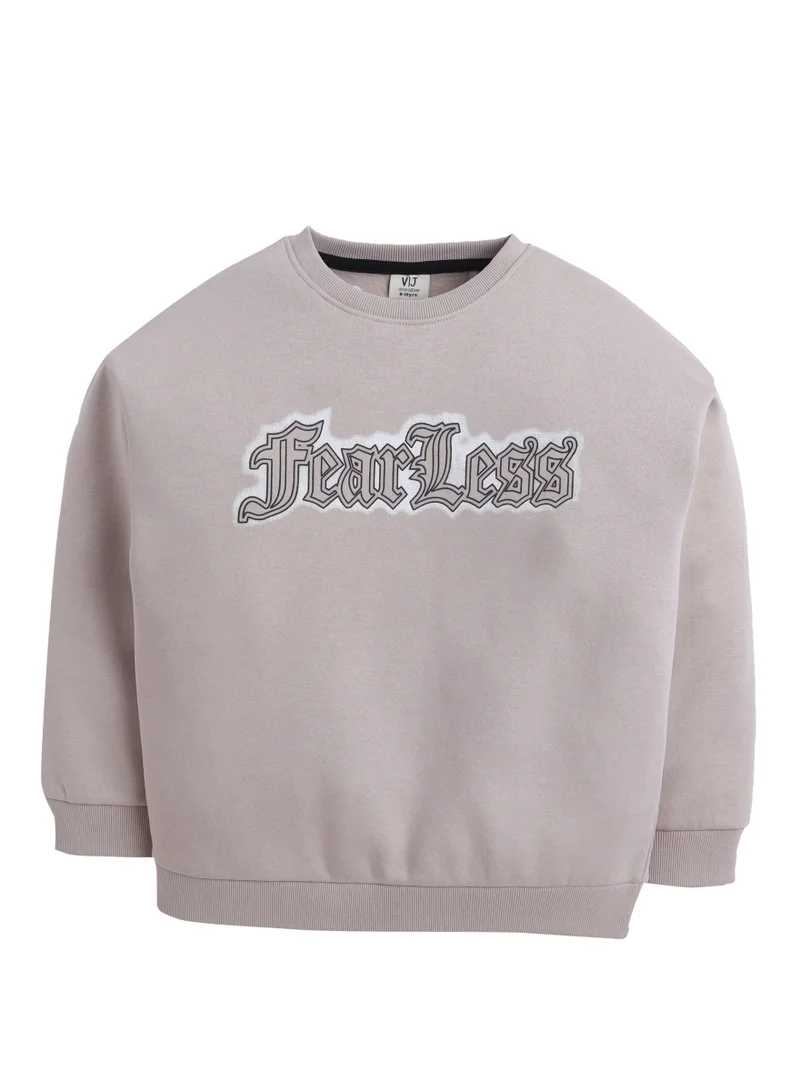 فكتور اند جين بلوزة قطنية للأولاد باللون البيج بطبعة شجاع