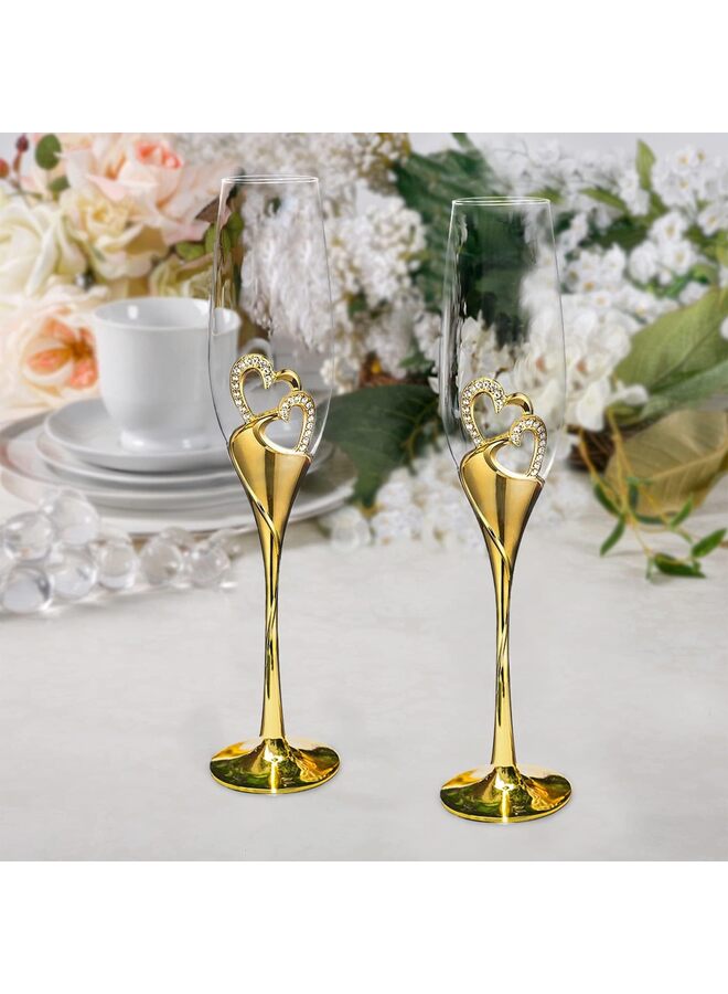 طقم كؤوس شمبانيا فاخر من قطعتين، مطلية بالذهب، مزينة بحواف مرصعة بقلوب مرصعة بأحجار الراين، مثالية لحفلات الزفاف والذكرى السنوية والمناسبات الخاصة. - Image 4