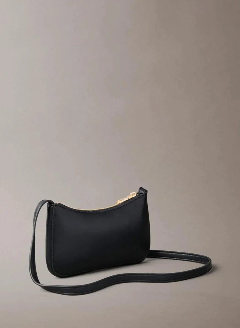 Calvin Klein Black Embossed Monogram Mini Shoulder Bag for Women | Best Price UAE
