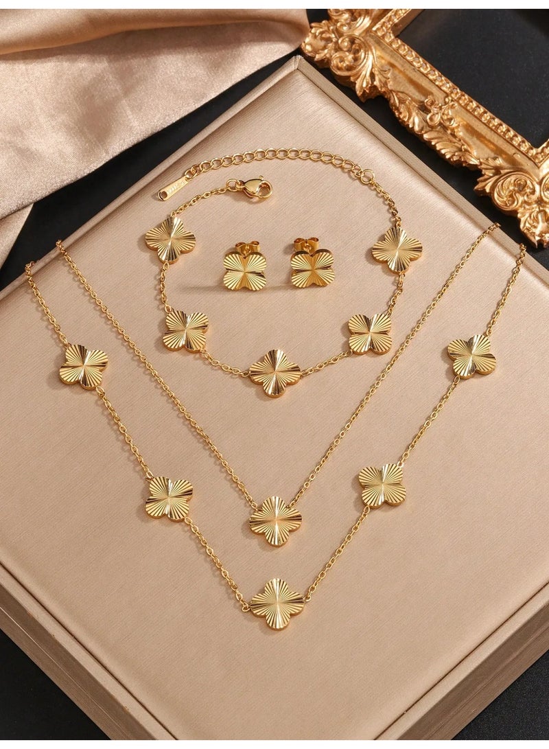 اكسسوار نسائي طقم مكون من سلسلتين ، اقراط و سوار  بتصميم زهره مطليه بلون الذهب  مناسب لحفلات الاعراس ، الخطوبه ، هدايا اعياد الميلاد ، هدايا يوم الام ، هدايا يوم الحب و جميع المناسبات - Image 1