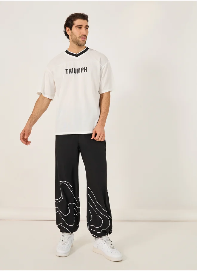 Styli Styli Front and Back Varsity Print Boxy T-Shirt