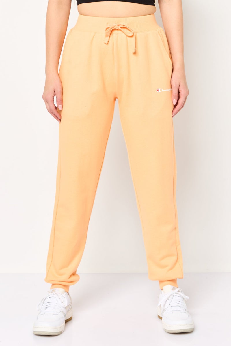 Champion Women Sportswear Fit Brand Logo Outdoor Jogger Pants, Peach - Image 1