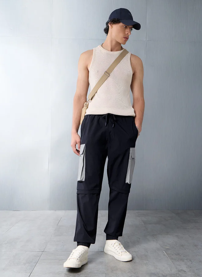 The Souled Store  The Souled Store Men Relaxed Fit Solid Navy Blue Parachute Pants  | Best Price UAE