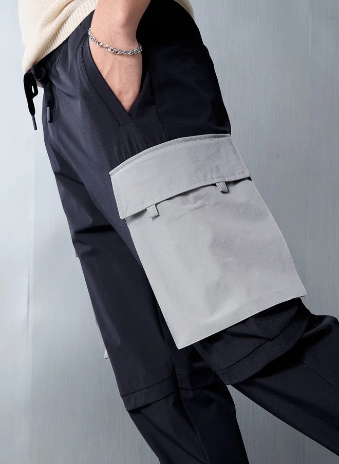 The Souled Store  The Souled Store Men Relaxed Fit Solid Navy Blue Parachute Pants  | Best Price UAE