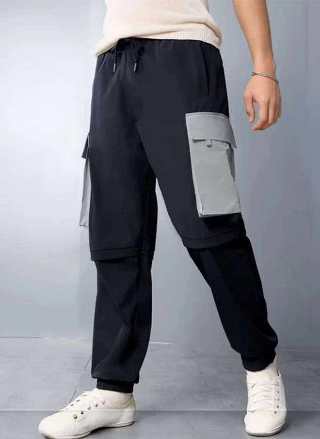 The Souled Store  The Souled Store Men Relaxed Fit Solid Navy Blue Parachute Pants  | Best Price UAE