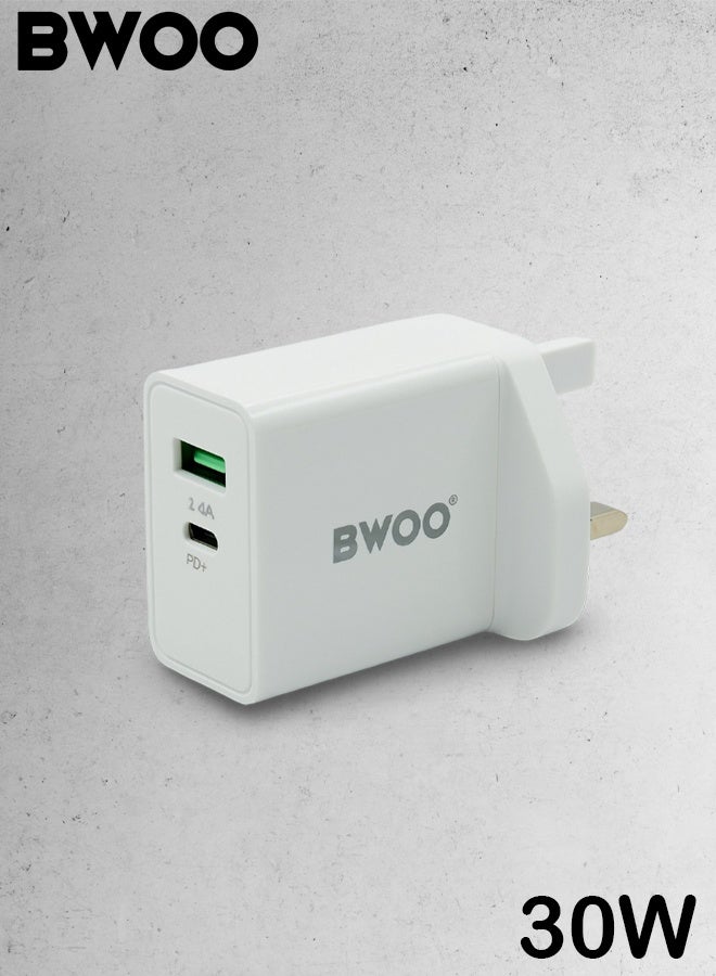 بوو شاحن حائط سريع BWOO ثنائي المنفذ USB-C PD بقوة 30 واط (قابس المملكة المتحدة). وحدة توصيل طاقة عالية السرعة للأجهزة اللوحية، وأجهزة الكمبيوتر المحمولة، وسماعات الأذن، والأجهزة الذكية. وحدة شحن صغيرة الحجم وآمنة، متعددة الحماية (من ارتفاع درجة الحرارة، الجهد، التيار، قصر الدائرة). - Image 1