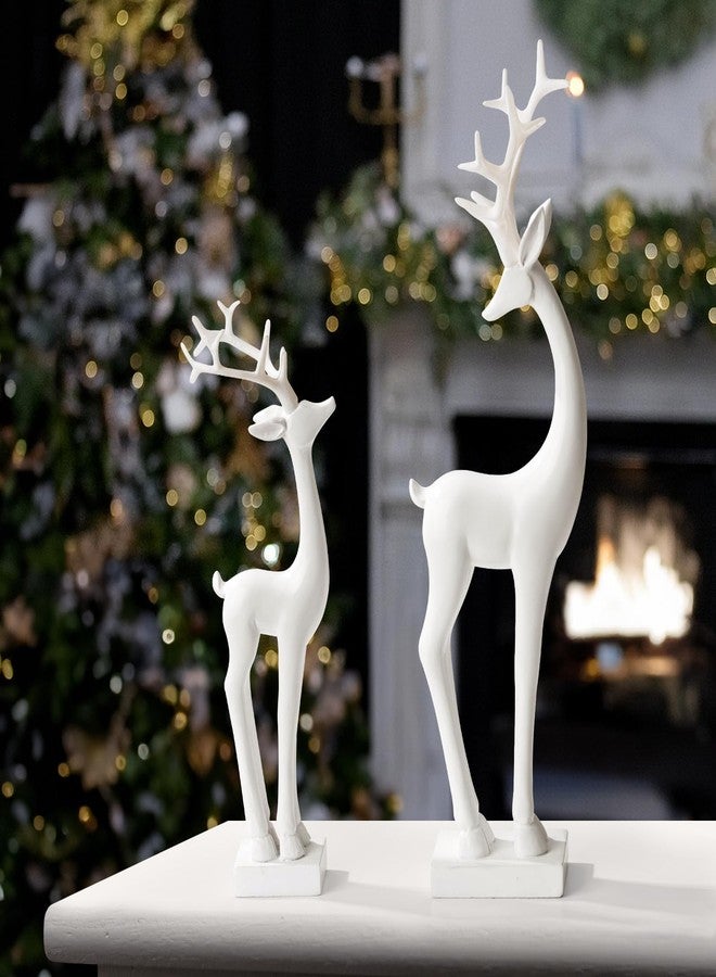 Pawliss Resin Christmas Reindeer Figurines: 2pcs White Christmas Deer Statues, Elegant Accent Winter Deer Table Ornaments, Classic Gifts Xmas Decorations for The Home - Image 1