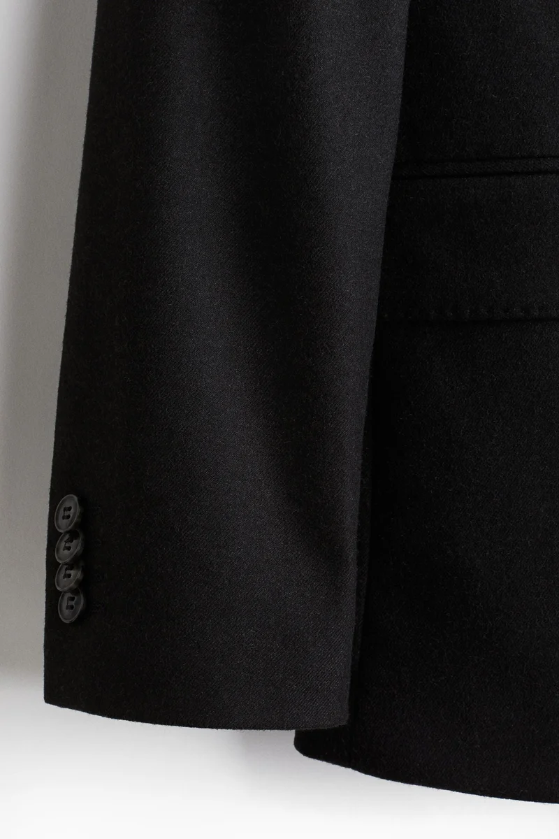 اتش اند ام جاكيت بأزرار مزدوجة وقصّة عادية