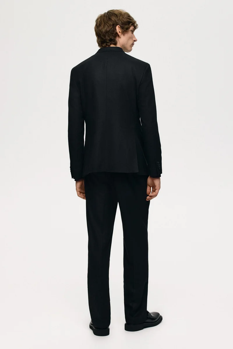 اتش اند ام جاكيت بأزرار مزدوجة وقصّة عادية