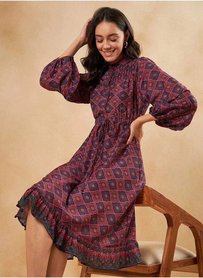 FEMELLA All Over Print Knee Length Dress with Tie Up by Styli