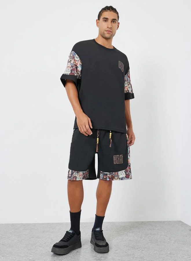 Styli Men Black Oversized Printed T-Shirt and Shorts Co-Ords