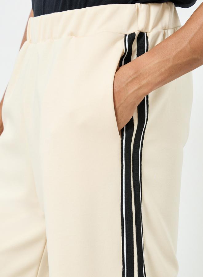 Styli Men Cream Side Taping Striped Oversized Joggers - Image 4