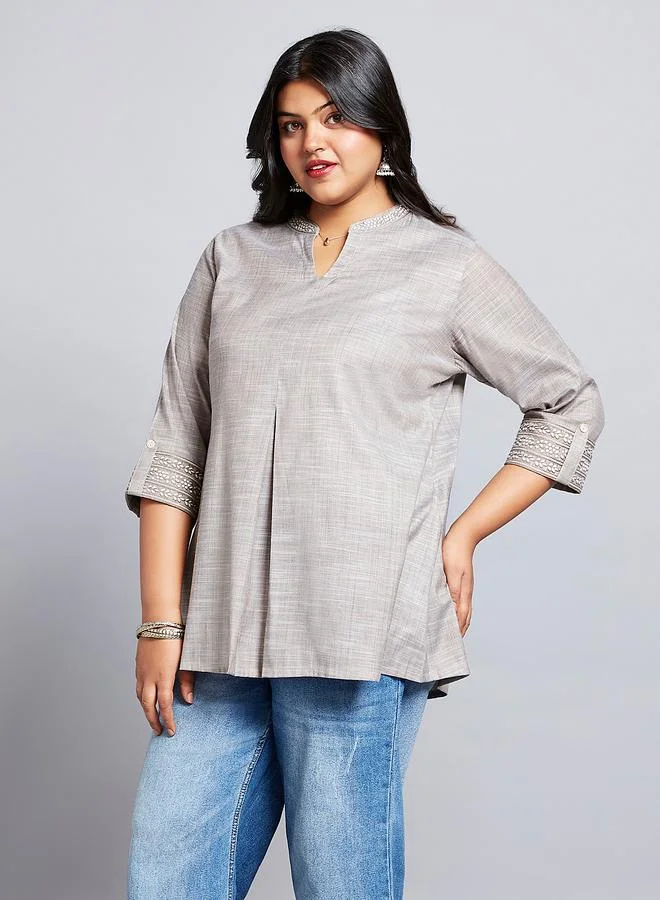 جلو باص تونيك بمقاس كبير مع أكمام بطول 3/4