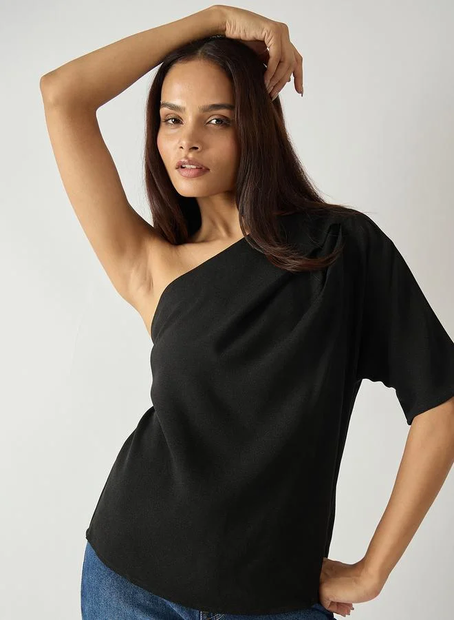 Femmella  Black Solid One Shoulder Top for Women | Best Price UAE