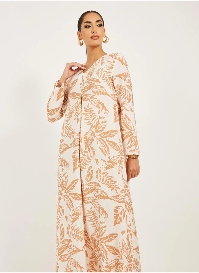 Styli all over foilage print jalabiya is soft fabric w/ front pleat detail