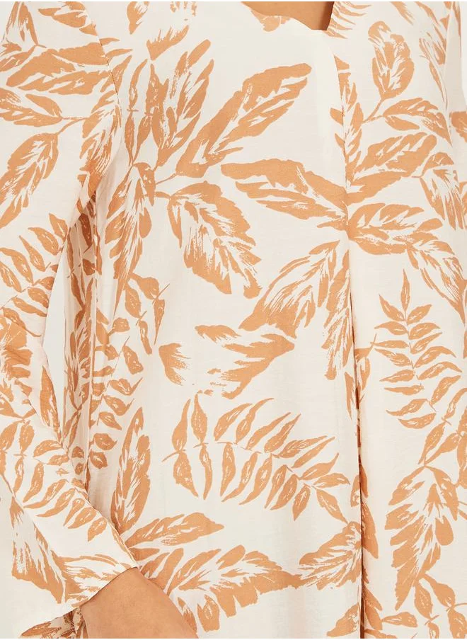 Styli all over foilage print jalabiya is soft fabric w/ front pleat detail