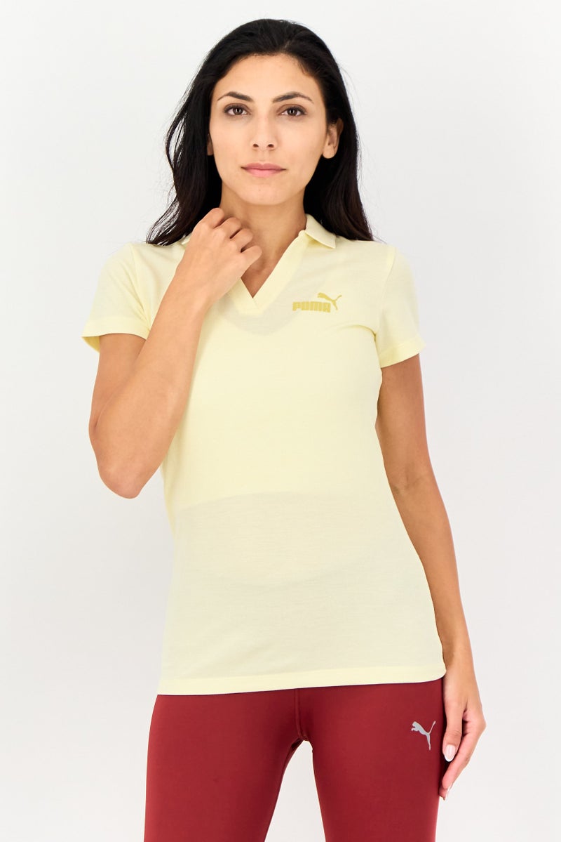 PUMA قميص بولو خارجي للنساء بقصة عادية بأكمام قصيرة، أصفر - Image 1