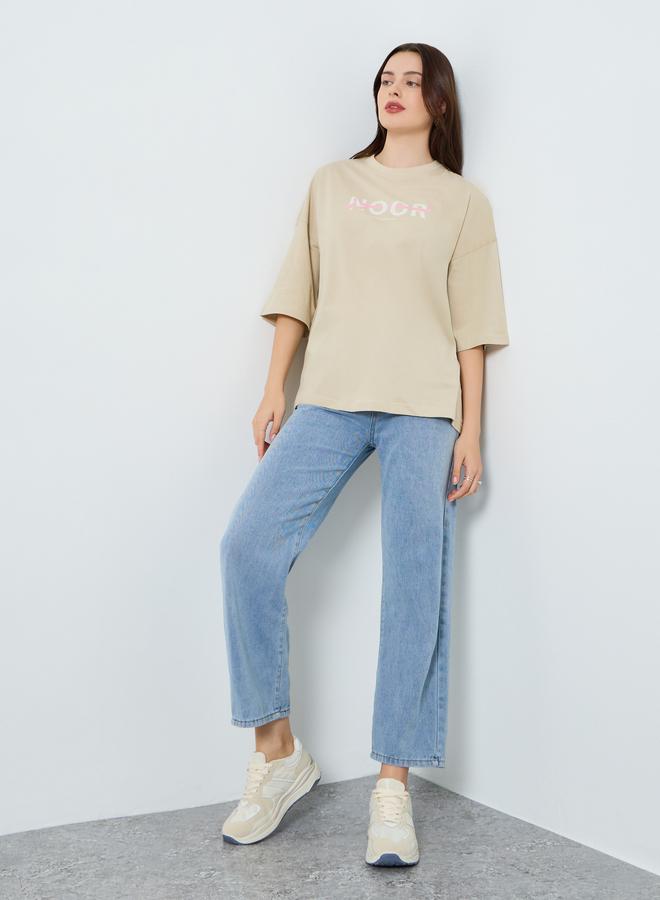 Styli Women Beige Slogan Print Oversized T-Shirt - Image 2