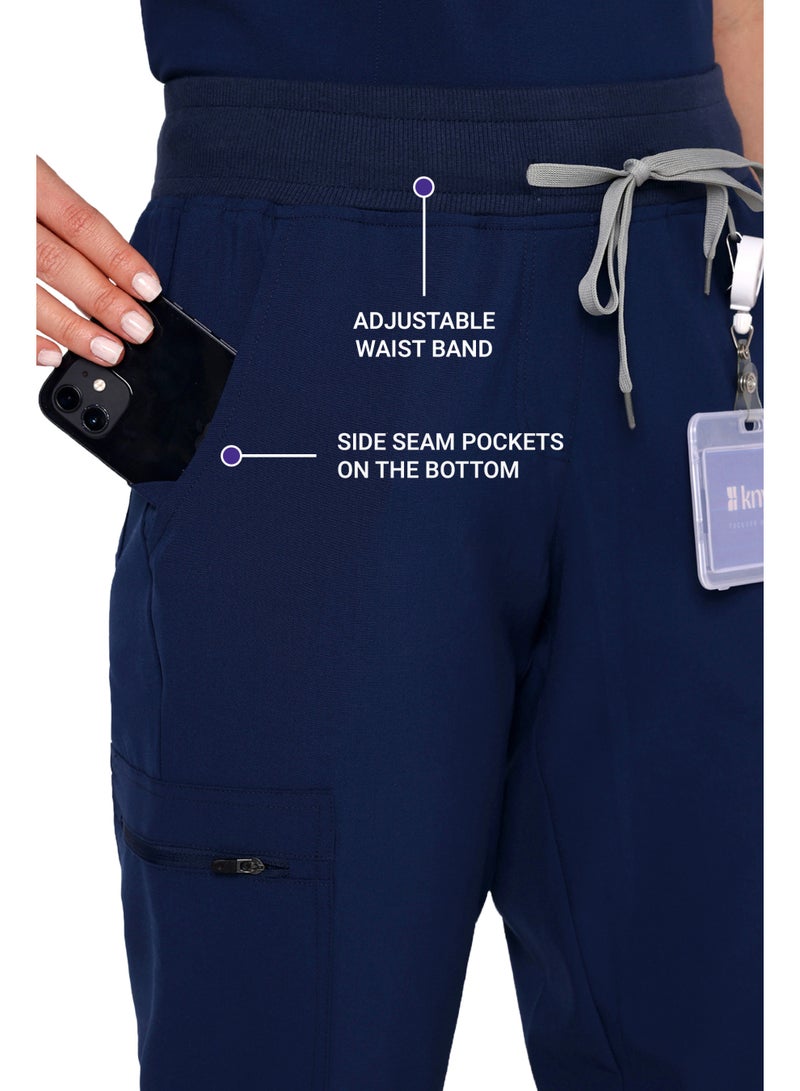 KNYA بدلة طبية نسائية من KNYA Ecoflex | 8 جيوب | بلوزة ماندرين | بنطال كارجو | قماش مطاطي في أربعة اتجاهات | للأطباء (مقاس 2XL، أزرق داكن) - Image 4