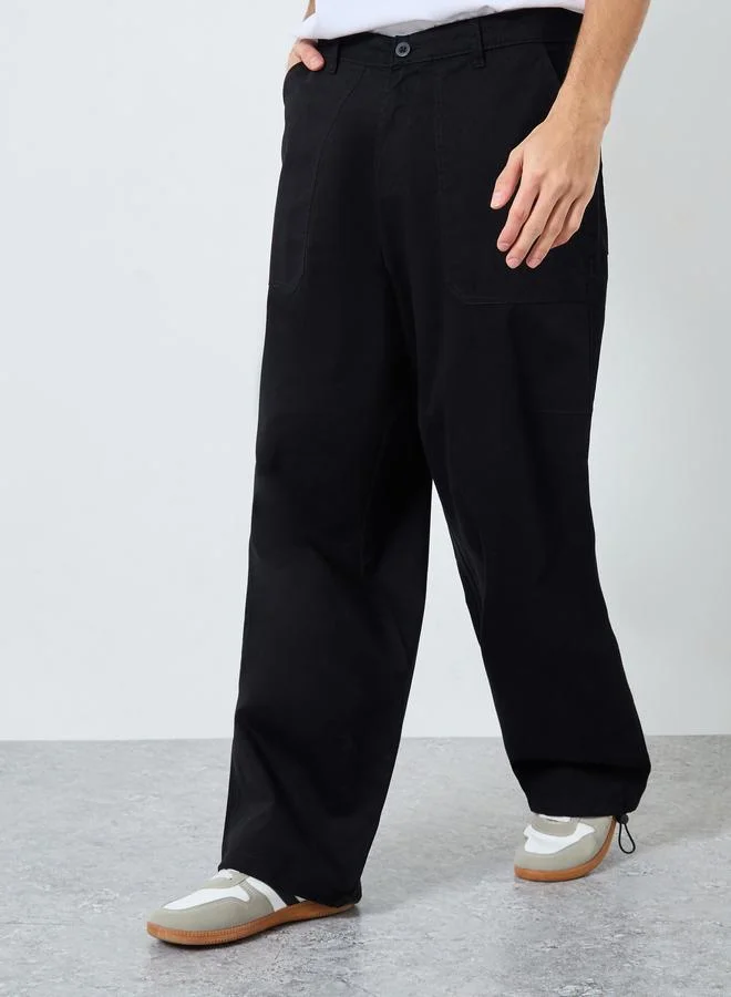 Styli Men Black Relaxed Fit Paneled Pants