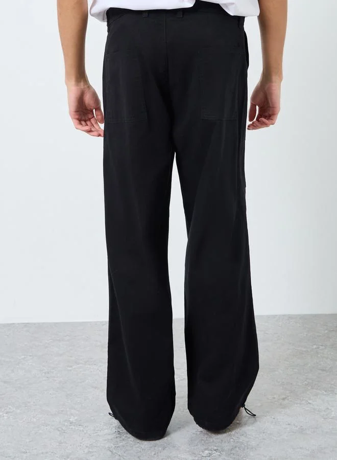 Styli Men Black Relaxed Fit Paneled Pants