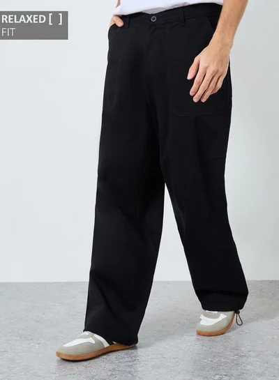 Styli Men Black Relaxed Fit Paneled Pants