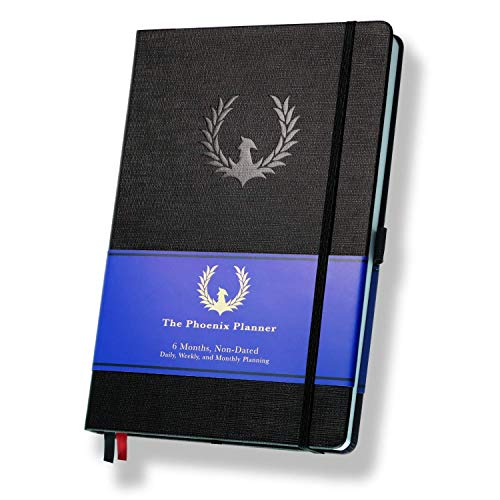Phoenix Planner The Phoenix Planner - Best Daily Calendar and Agenda for Goal Setting, Boost Happiness and Productivity - Gratitude Journal, Habit Tracker, Quarterly Business Planner - 6 Months, Undated (Charcoal) - Image 1