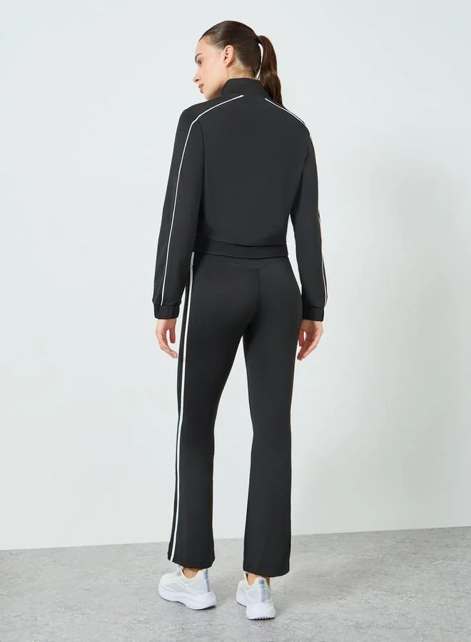 Styli Active  Women Black Contour Piping Full Zip Jacket and and Flared Pants Set for Women | Best Price UAE
