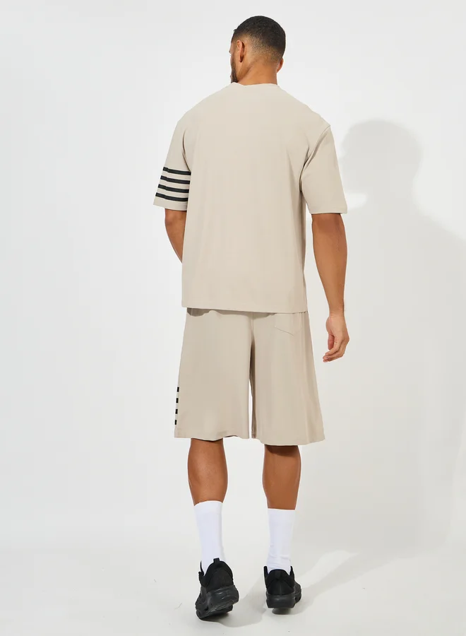 Styli Styli Oversized Stretch Pique Knit T-Shirt and Striped Shorts Set