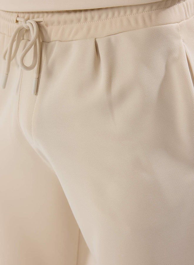 trendyol Stone Slim Fit Tie Waist Elastic Knitted Casual Pants - Image 4