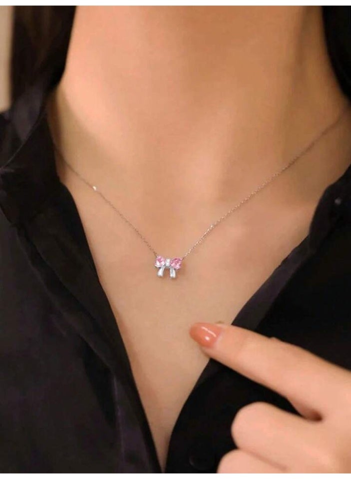 925 ستيرلنغ سيلفر تشارمز سلسال بقلادة فاخرة ناعمة مصنوعة من الفضة الإسترلينية عيار 925 بجودة عالية ودقة شديدة من الكريستال الطبيعي من حجر الزيركون على شكل فيونكة وردية لتعطي مظهرا رائعا للأميرة التي تستحقها - Image 2