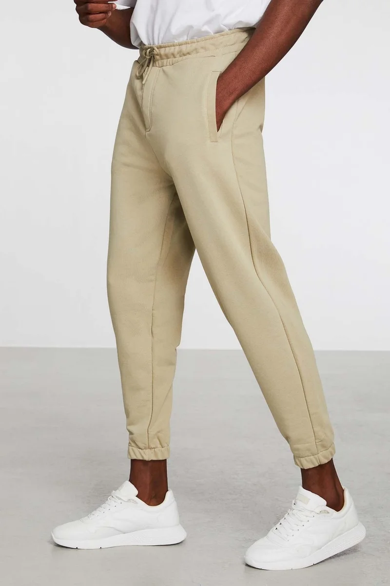 جريميلانج Irregular Men's Regular Fit Elastic Leg Diagonal Fabric Beige Sweatpants
