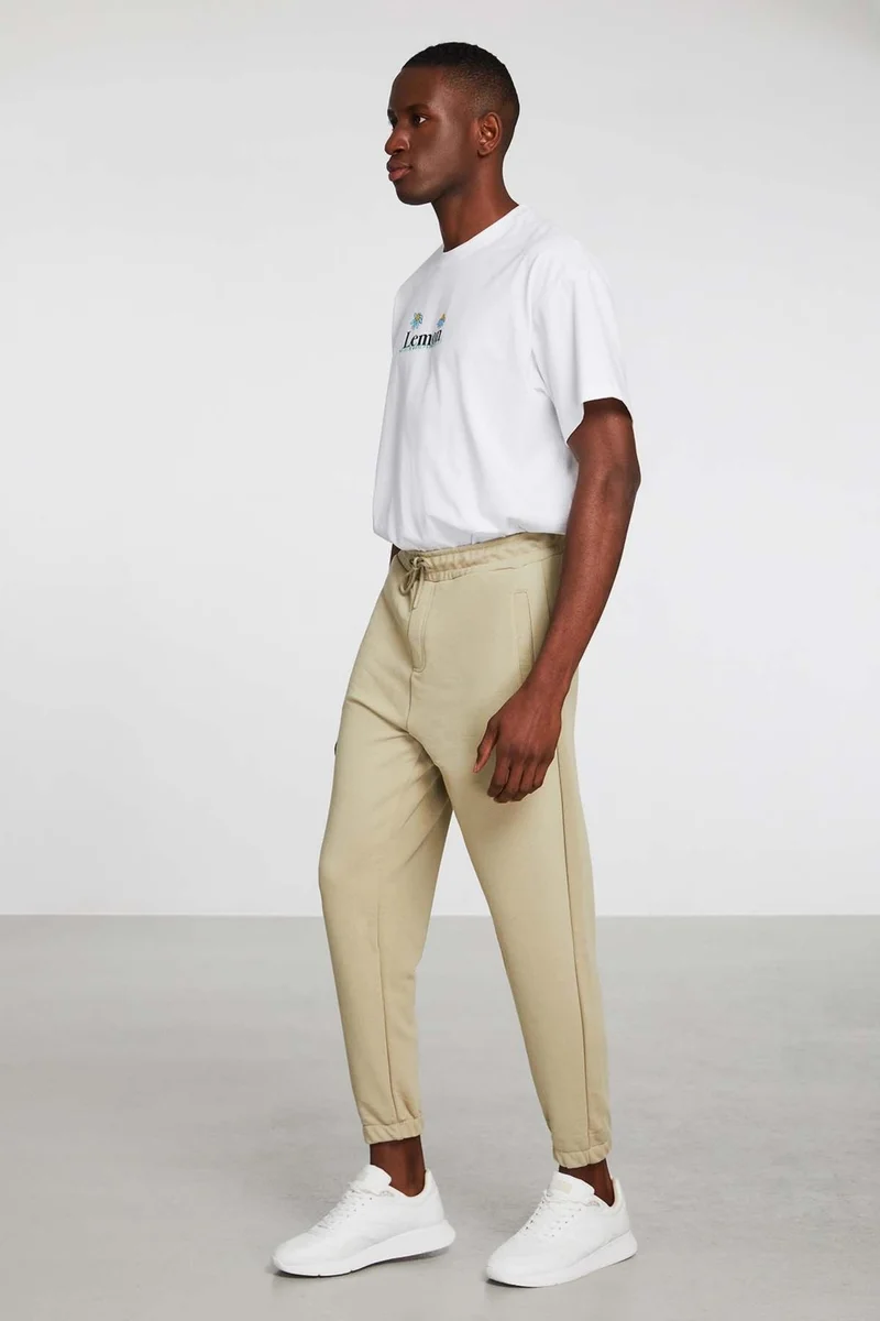 جريميلانج Irregular Men's Regular Fit Elastic Leg Diagonal Fabric Beige Sweatpants