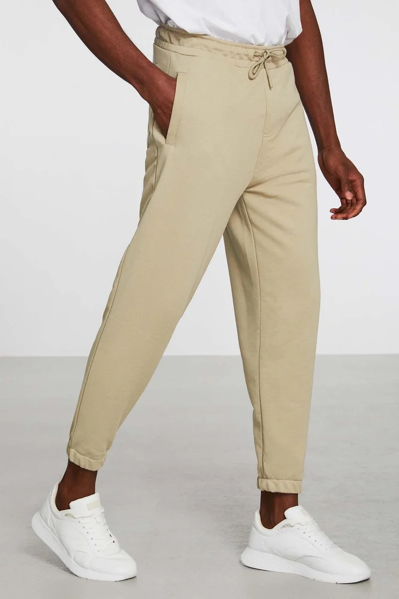 جريميلانج Irregular Men's Regular Fit Elastic Leg Diagonal Fabric Beige Sweatpants