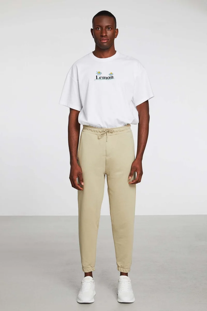 جريميلانج Irregular Men's Regular Fit Elastic Leg Diagonal Fabric Beige Sweatpants