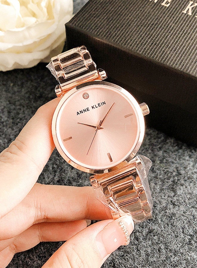 Anne Klein Women's Tonneau Simplicity rose gold Fashion Watch with rose gold Stainless Steel Strap - Image 1