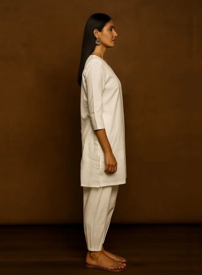 Abhishti Box Pleat solid white Kurta with knife pleat salwar pants